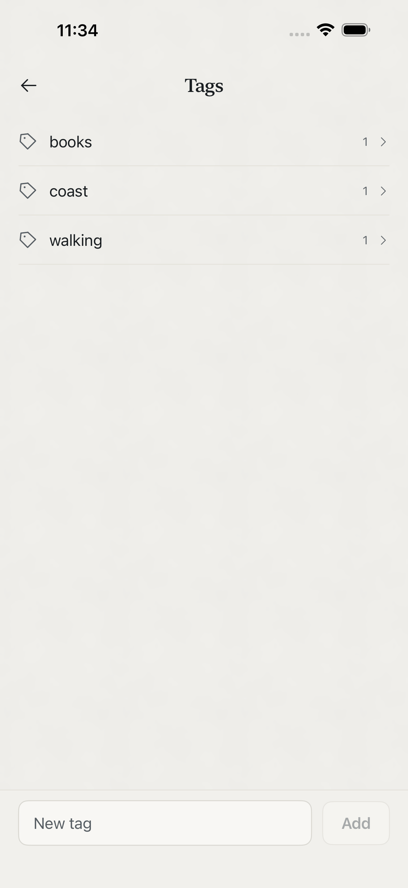 Zen Slate on iPhone: the tags screen listing each tag with how many notes use it, and a field to add another