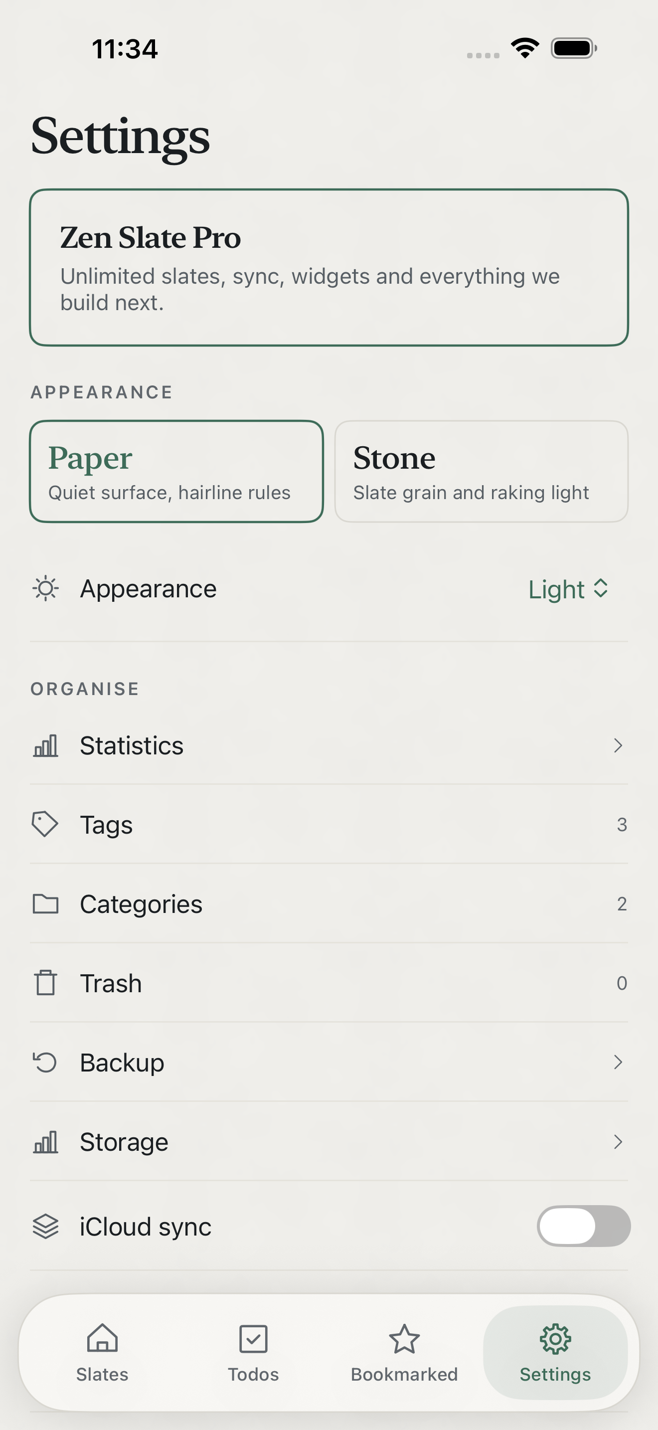 Zen Slate on iPhone: settings, with the Pro card, paper or stone appearance, and rows for statistics, tags, categories, trash, backup, storage and iCloud sync